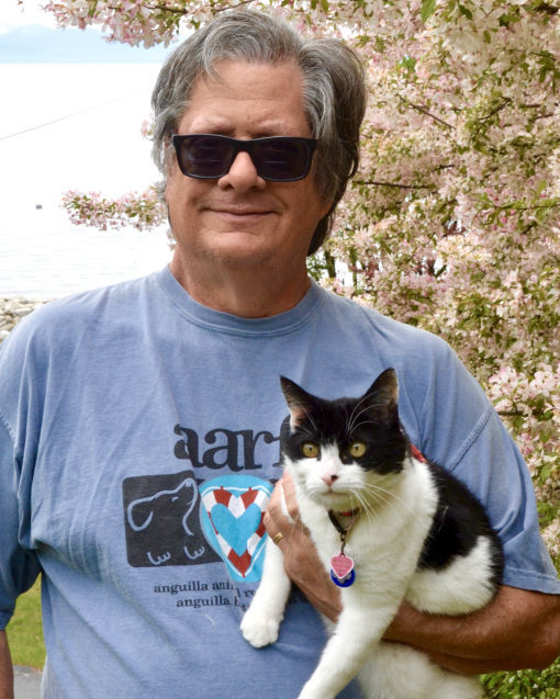 Mark Baumwell, U.S. Director and webmaster, his cat Lindy