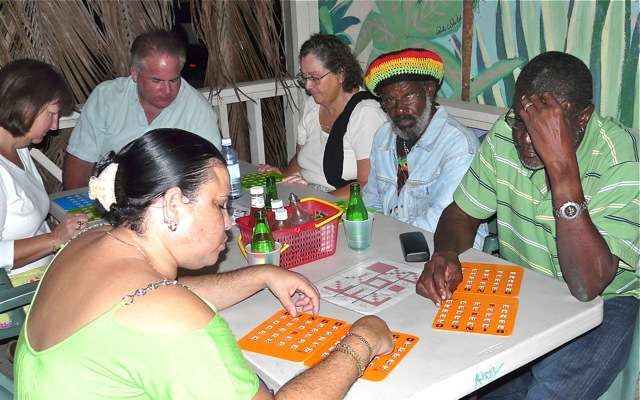 Players concentrate on their Bingo cards as the numbers are called