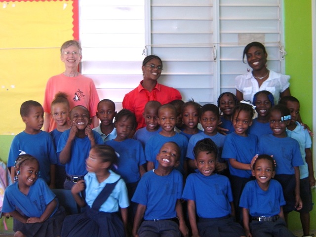 Carol, the teachers and kindergarten class This images shows Carol with a Kindergarten class