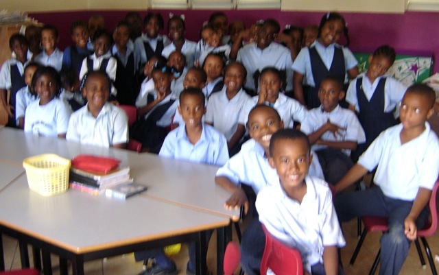 Two first grade classes pose together Two first grade classes pose together