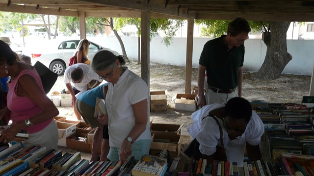 We always have many books for sale! This photo shows people participating in one of our yard sales