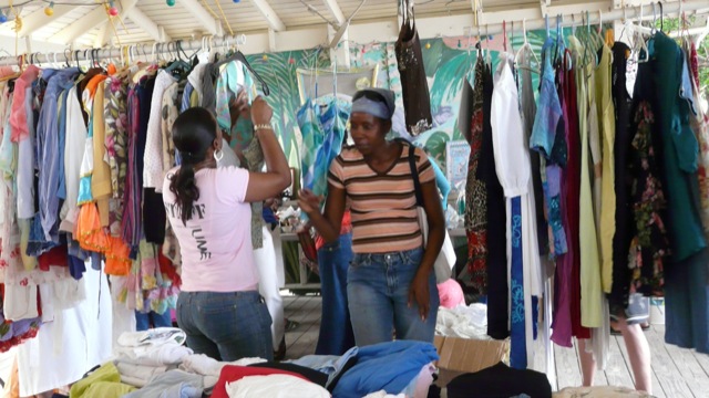 More clothing This photo shows people participating in one of our yard sales