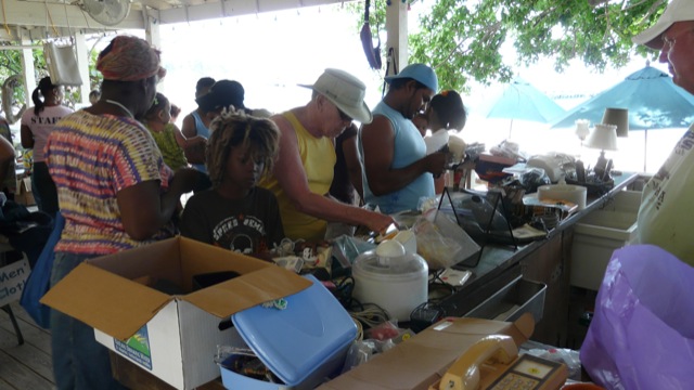 Many electronics are always for sale This photo shows people participating in one of our yard sales