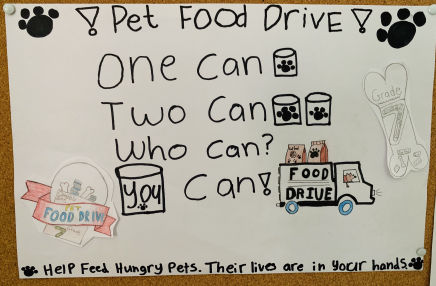 A poster advertising the pet food drive 