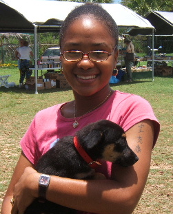 adopted puppy with red collar