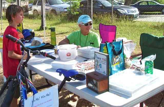 A photo showing Althea at the AARF booth