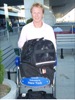 The kittens, with owner Paul in a soft crate in the airport at New York