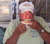 Mike J enjoys a bit of cake at the AGM